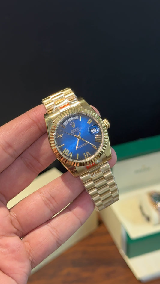 DayDate | 36mm | Gold Chain  |  Gradient Blue Index Dial