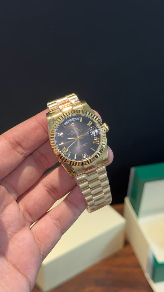 DayDate | 36mm | Gold Chain |  Smokey Black Dial