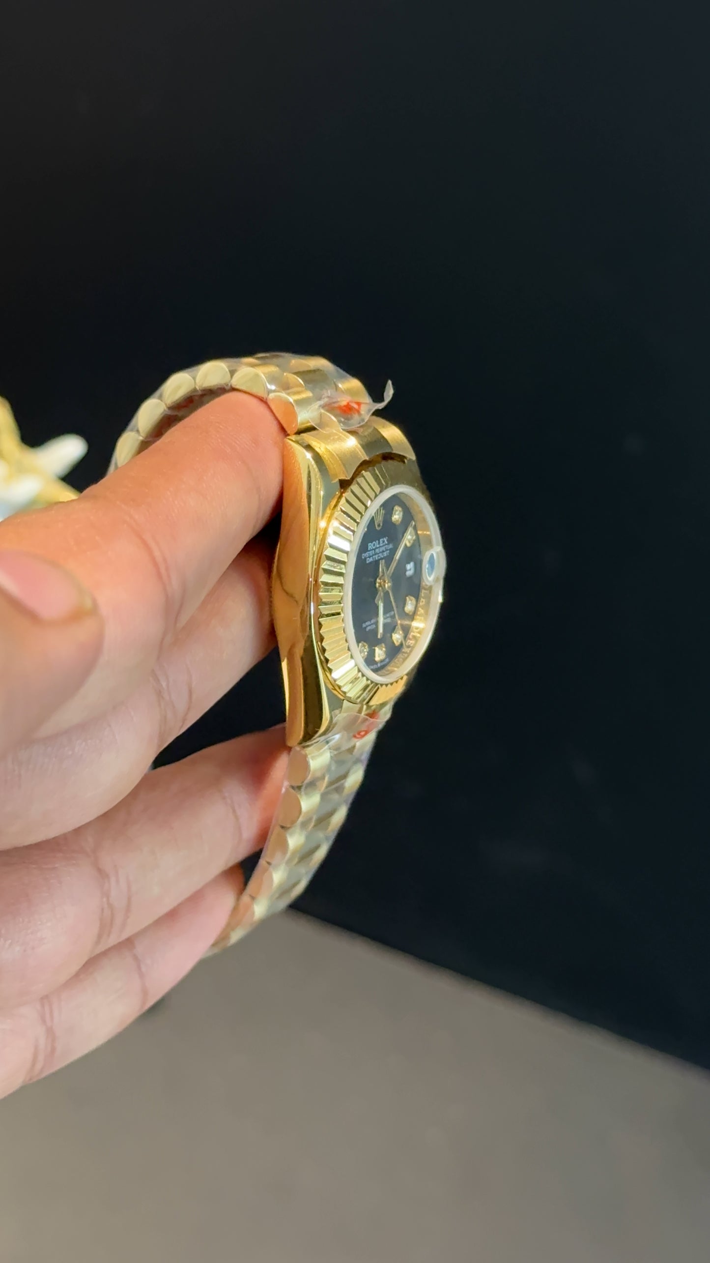 Datejust 27mm | Gold Jubilee Chain | Black Diamond Dial