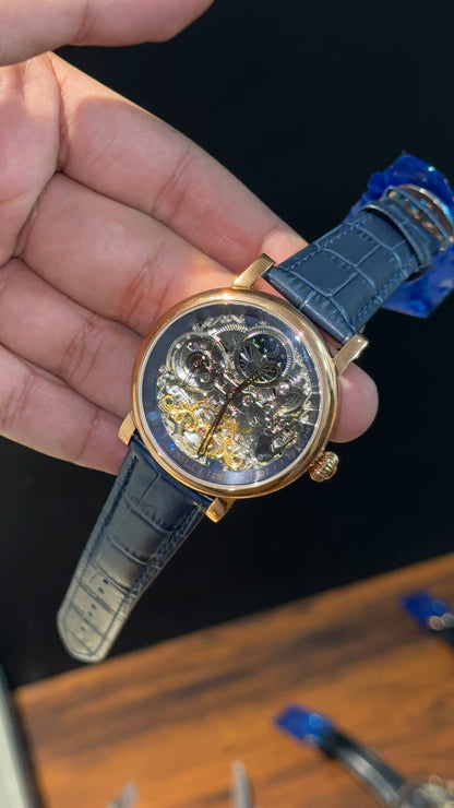 Patek Rose | Moonphase | Yellow Pendulum | Blue Leather Strap | Grey Machine | Blue Dial