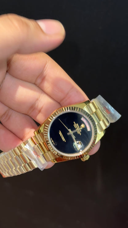DayDate | 36mm | Gold President Chain | Black Plain Dial