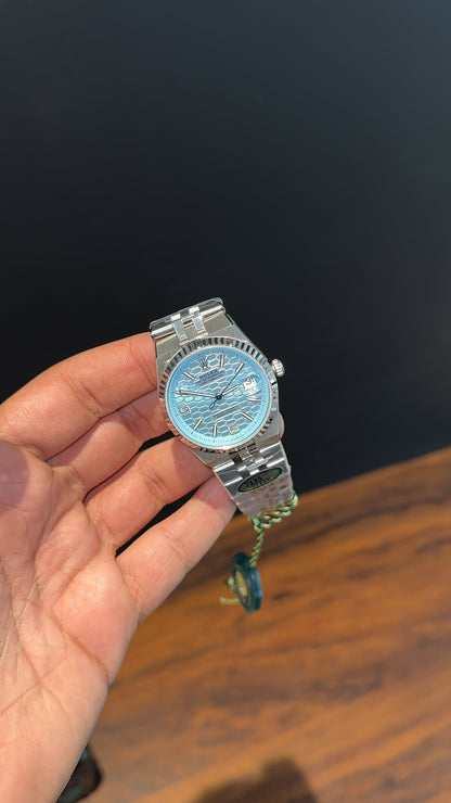 Premium Land Dweller | 36mm | Silver Chain |  Sky Blue Textured Dial